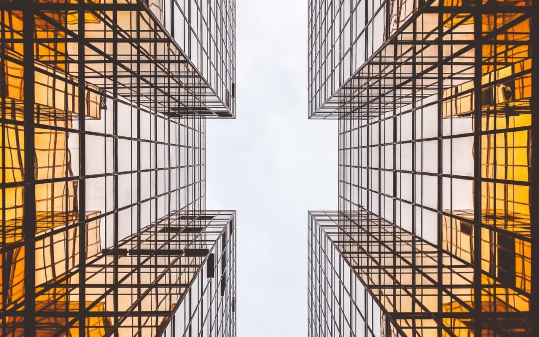 Orange reflective architecture (Photo by Alex Wong on Unsplash)